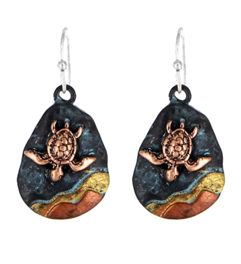 Aretes Colgantes Tortuga Marina – Cobre Patinado Artesanal de DianaL Boutique